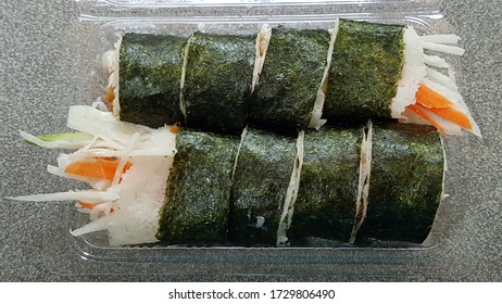 Japanese Style Vegetarian Seaweed Sushi Rolls In Takeaway Packed Food Plastic Container