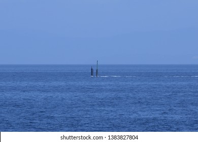 Japanese Submarine At Periscope Depth.