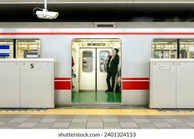 Japanese subway station platform door - Powered by Shutterstock