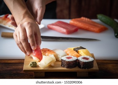 Japanese Sushi Chef Making Nigiri Sushi