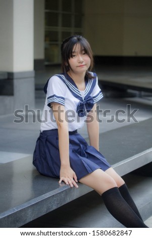japanese teen beautiful girl in student uniform happy and relax