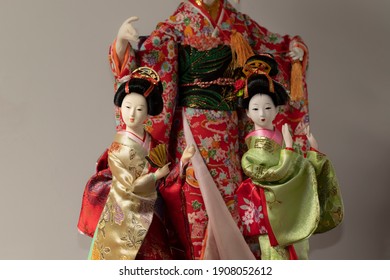 Japanese Traditional Dolls On Grey Background