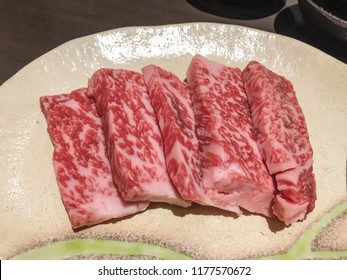Japanese traditional. Hida Beef on cream plate prepare for  barbecue at Japan street food