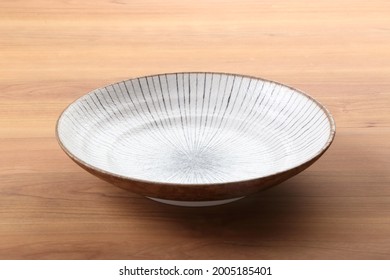 Japanese Traditional Tableware On A Brown Table