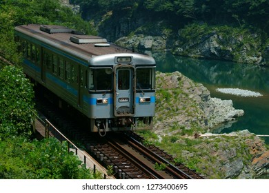A Japanese train running near Oboke gorge in Tokushima, Japan. 