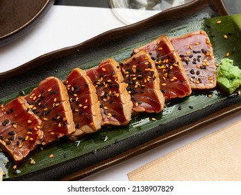 Japanese Tuna Sashimi Tataki On Green Leaf