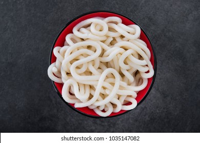 Japanese Udon Noodles In Red Bowl On Stone Table