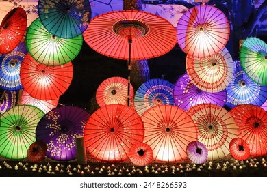 Japanese umbrellas neatly arranged and lit up - Powered by Shutterstock