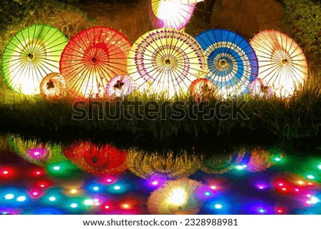 Japanese umbrellas neatly arranged and lit up