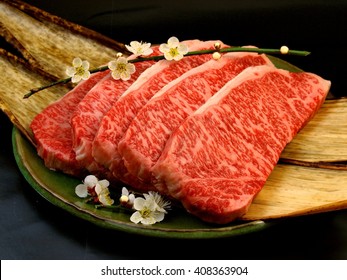 Japanese Wagyu Beef steak cuts with plum flower.