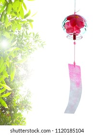 Japanese Wind Chime And Green Leaves