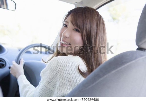 Japanese woman to drive a\
car