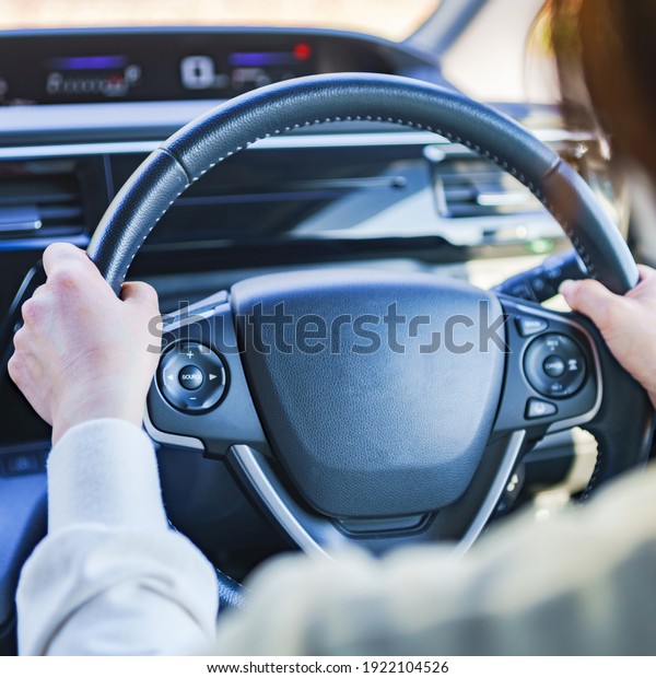 Japanese woman driving car\
safety