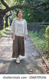 Japanese Woman Her 40s Walking On Stock Photo 2068709246 | Shutterstock