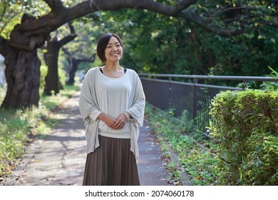 Japanese Woman Her 40s Walking On Stock Photo 2074060178 | Shutterstock