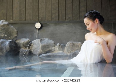 Japanese Woman In Hot Spring.