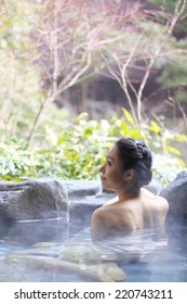 Japanese Woman In Hot Spring.