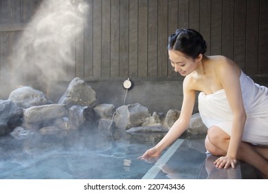 Japanese Woman In Hot Spring.