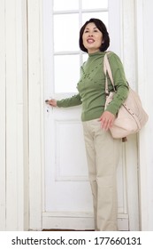 Japanese Woman Leaving House