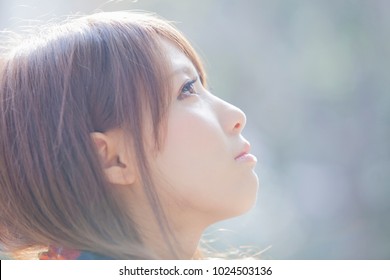 Japanese Woman Looking Up