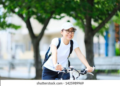 Japanese Woman Riding Bicycle Stock Photo 1425989969 | Shutterstock