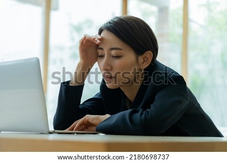 Japanese woman tired of work
