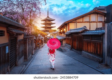 Japanese woman in traditional Kimono visit Yasaka Pagoda at Hokanji temple in Kyoto, Japan during full bloom cherry blossom in spring - Powered by Shutterstock