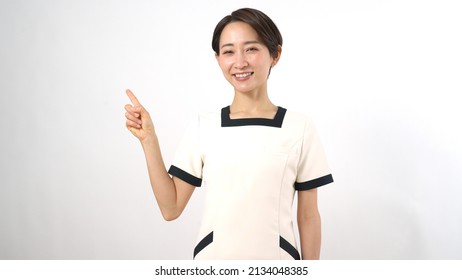 Japanese Woman In Uniform Pointing