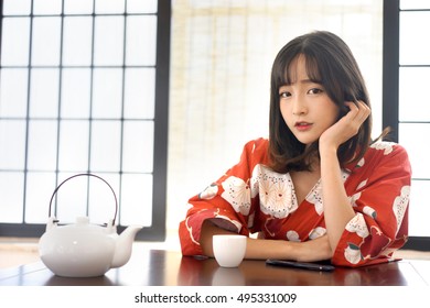 Japanese Woman In Washitsu Tatami Room