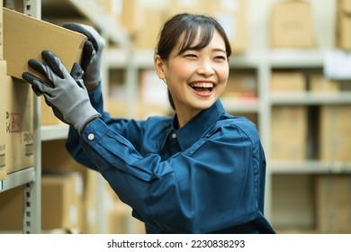 Japanese woman in work clothes - Shutterstock ID 2230838293