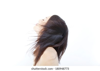 Japanese Woman's Hair Blown Away By The Wind