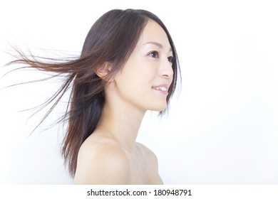 Japanese Woman's Hair Blown Away By The Wind