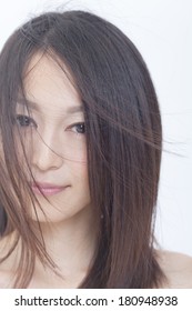 Japanese Woman's Hair Blown Away By The Wind