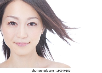 Japanese Woman's Hair Blown Away By The Wind