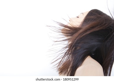 Japanese Woman's Hair Blown Away By The Wind