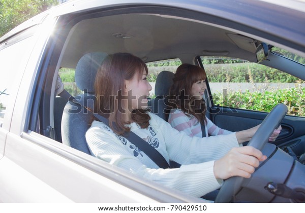 Japanese women friends and\
drive