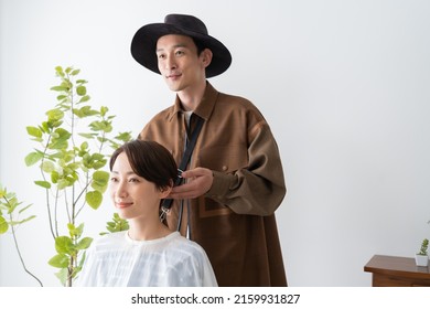 Japanese Women And Men Hairdressers Who Came To Cut Their Hair