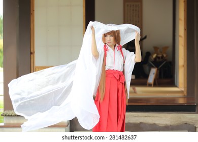 Japanese Women In Traditional Dress Miko