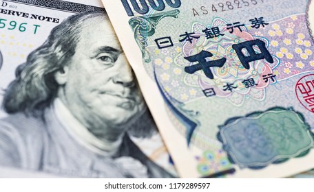 Japanese Yen and USD dollar bank note, currency exchange rate