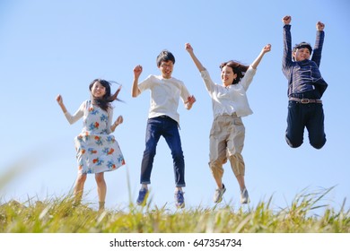 japanese young   group outdoor green - Powered by Shutterstock