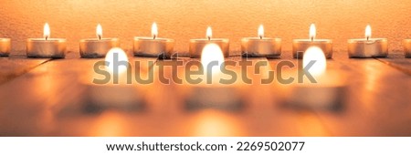 Japanese zen garden with three candlelights burning