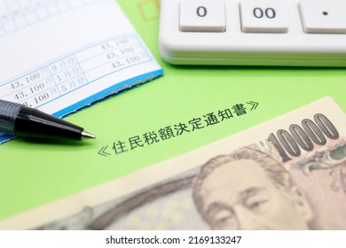 Japan's inhabitant tax collections. Translation: For the month of X. Japanese Yen. Resident tax amount determination notice. - Shutterstock ID 2169133247