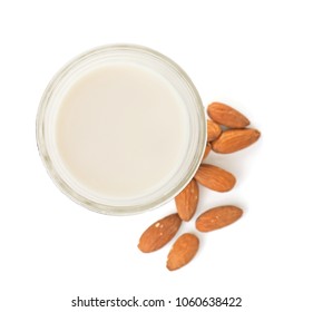 Jar With Almond Milk And Nuts On White Background, Top View