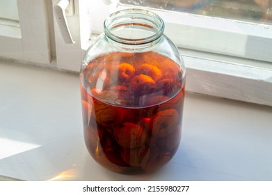 jar of apple compote on the windowsill. Selective focus