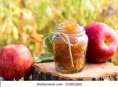 Jar Of Apple Preserves Outdoor Shot On Grass Background