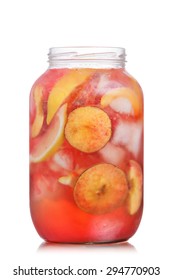 Jar Of Carbonated Peach Lemonade Garnished With Peach Wheel And Lemon Slice. Glass Jar Full Of Cold Peach Spritzer With Peach And Lemon Slices.