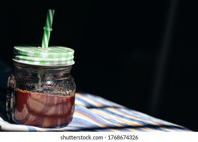 Jar Filled With Healthy Beet Root Smoothie Placed In Sunlight. 