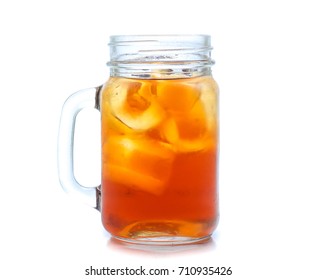 jar glass of iced tea with lemons  isolated on a white background
