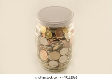 Jar Half Full Of Money