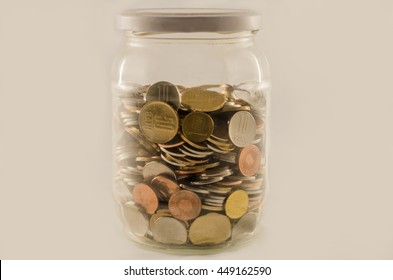 Jar Half Full Of Money